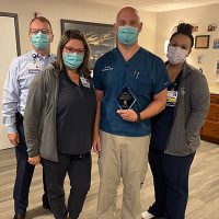 Dr. Ekey and LGHM Staff