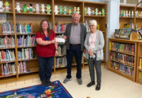 Jim Marchman, and BUMC representative Diane Hoover, presented Jim's donation to Beeks Librarian, Rhonda Burch