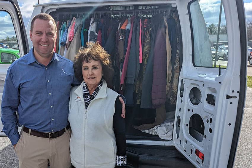 Marcus Moore (A Cleaner World) & Brenda Eanes (ABWA) with coats in van