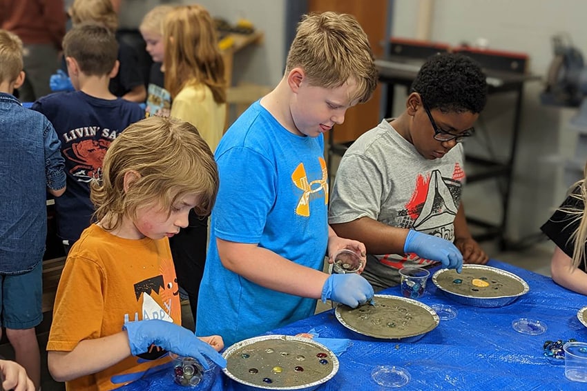 Grade schoolers make stepping stones 21