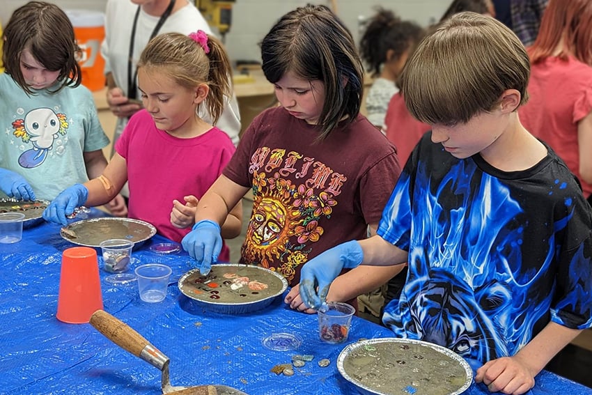 Grade schoolers make stepping stones 22