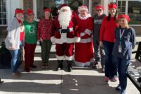 Santa and Elves of Volunteer Montgomery L to R: (Alex Strickler, Carol Trutt, Jennifer Ament, Santa, Mrs. Claus, Robbie Hall, Mandy Hayes, Karen Anders)