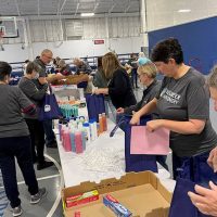 A record number of thirty-six volunteers assemble the bags!