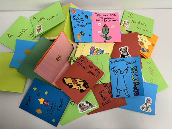 Volunteers make cards for students 4